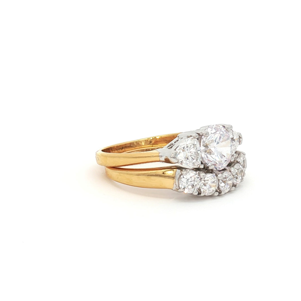 Three Stone Ring with Trillion Side Stones and Five Stone Curved Band