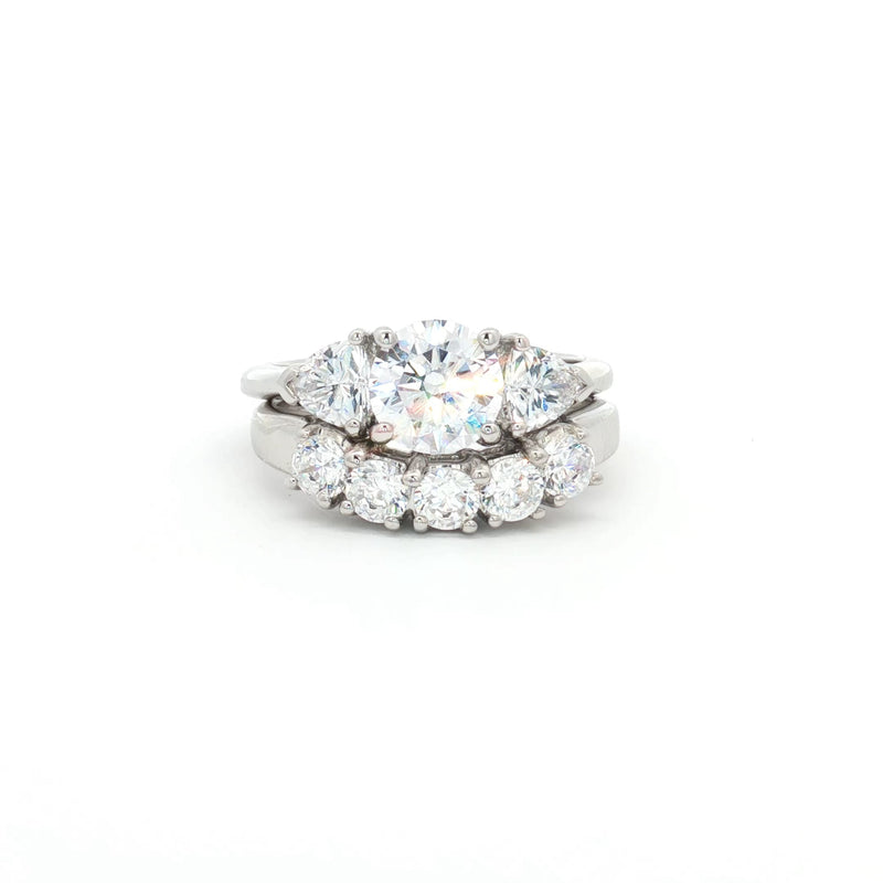 Three Stone Ring with Trillion Side Stones and Five Stone Curved Band