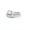 Three Stone Ring with Trillion Side Stones and Five Stone Curved Band