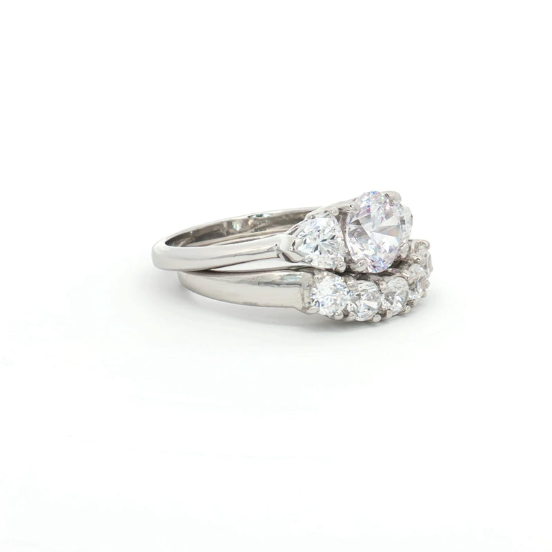 Three Stone Ring with Trillion Side Stones and Five Stone Curved Band