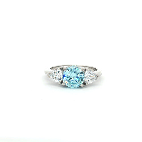 Three Stone Ring with Aqua Marine Brilliant Centre Stone and Trillion Side Stones