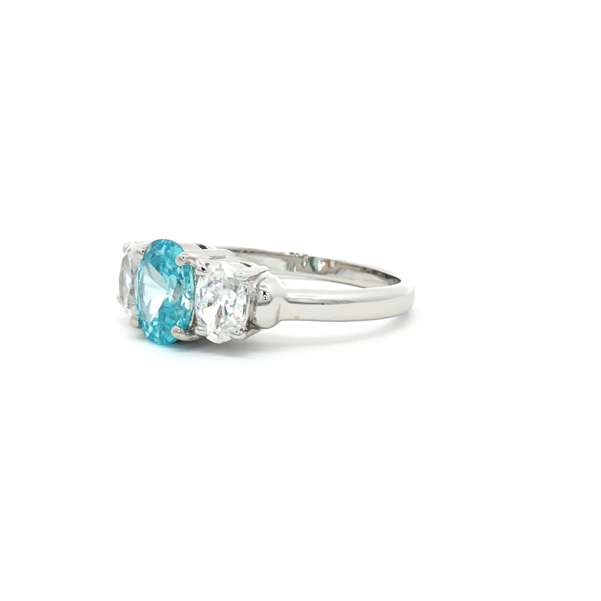 Oval Cut Three Stone Ring with Aqua Marine Centre Stone