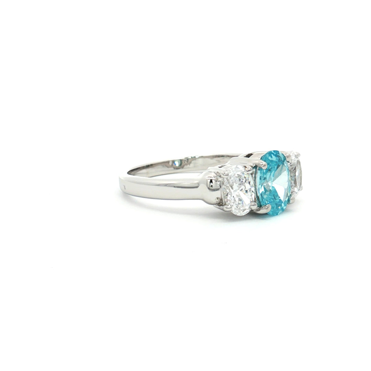 Oval Cut Three Stone Ring with Aqua Marine Centre Stone