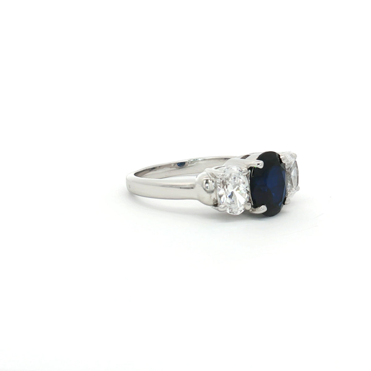 Oval Cut Three Stone Ring with Sapphire Centre Stone