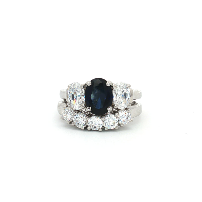 Oval Cut Three Stone Sapphire Ring and Five Stone Curved Band