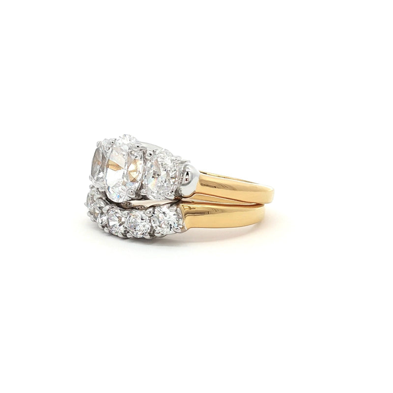 Oval Cut Three Stone Ring and Five Stone Curved Band in Yellow