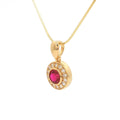 The Bezel Set Halo Pendant with a Ruby in Yellow