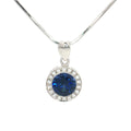 The Round Halo Pendant with a Sapphire