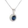 The Round Halo Pendant with a Sapphire