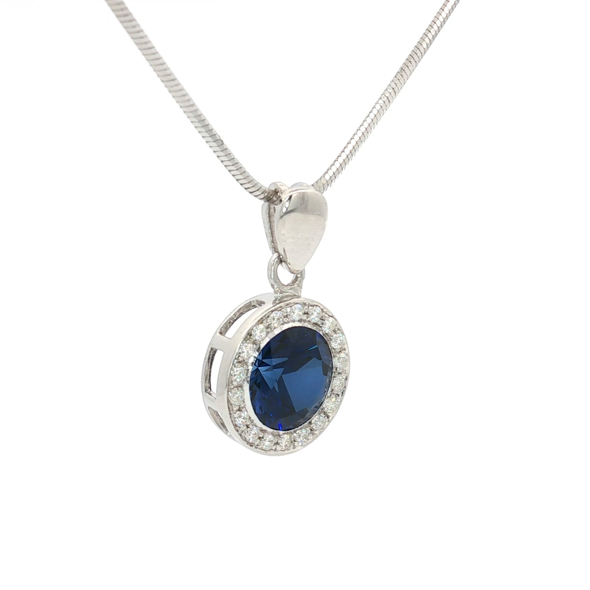 The Round Halo Pendant with a Sapphire