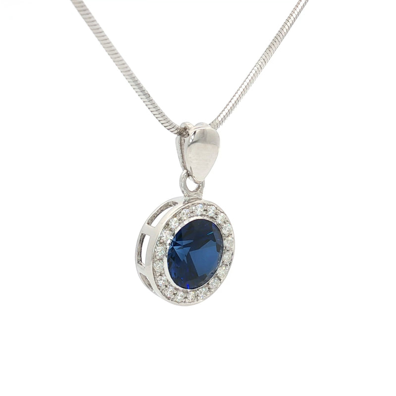 The Round Halo Pendant with a Sapphire