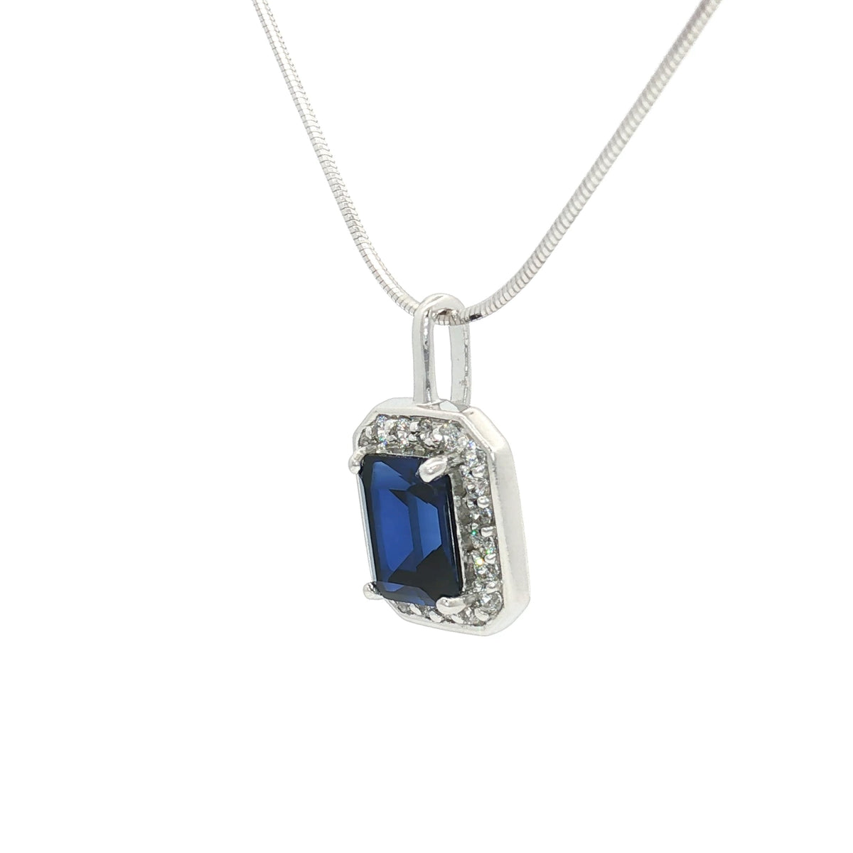 The Emerald Cut Halo Pendant with a Sapphire