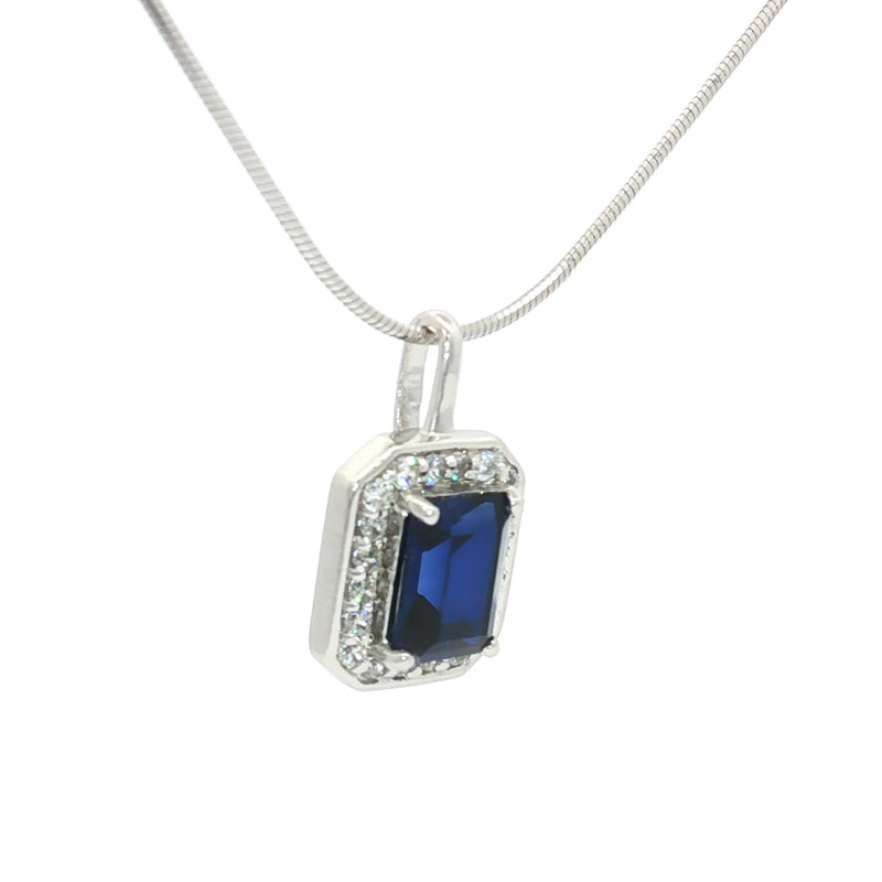The Emerald Cut Halo Pendant with a Sapphire