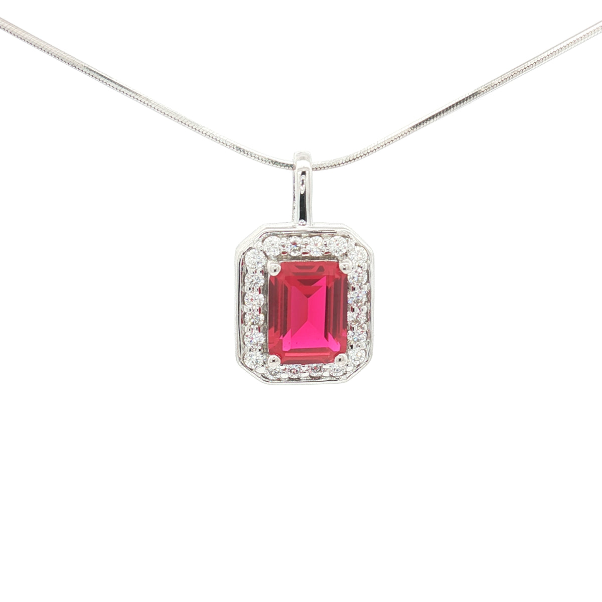 The Emerald Cut Halo Pendant with a Ruby