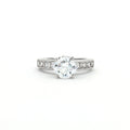 Brilliant Cut Solitaire Ring with Princess Cut Channel Setting