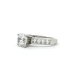 Brilliant Cut Solitaire Ring with Princess Cut Channel Setting