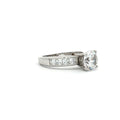 Brilliant Cut Solitaire Ring with Princess Cut Channel Setting