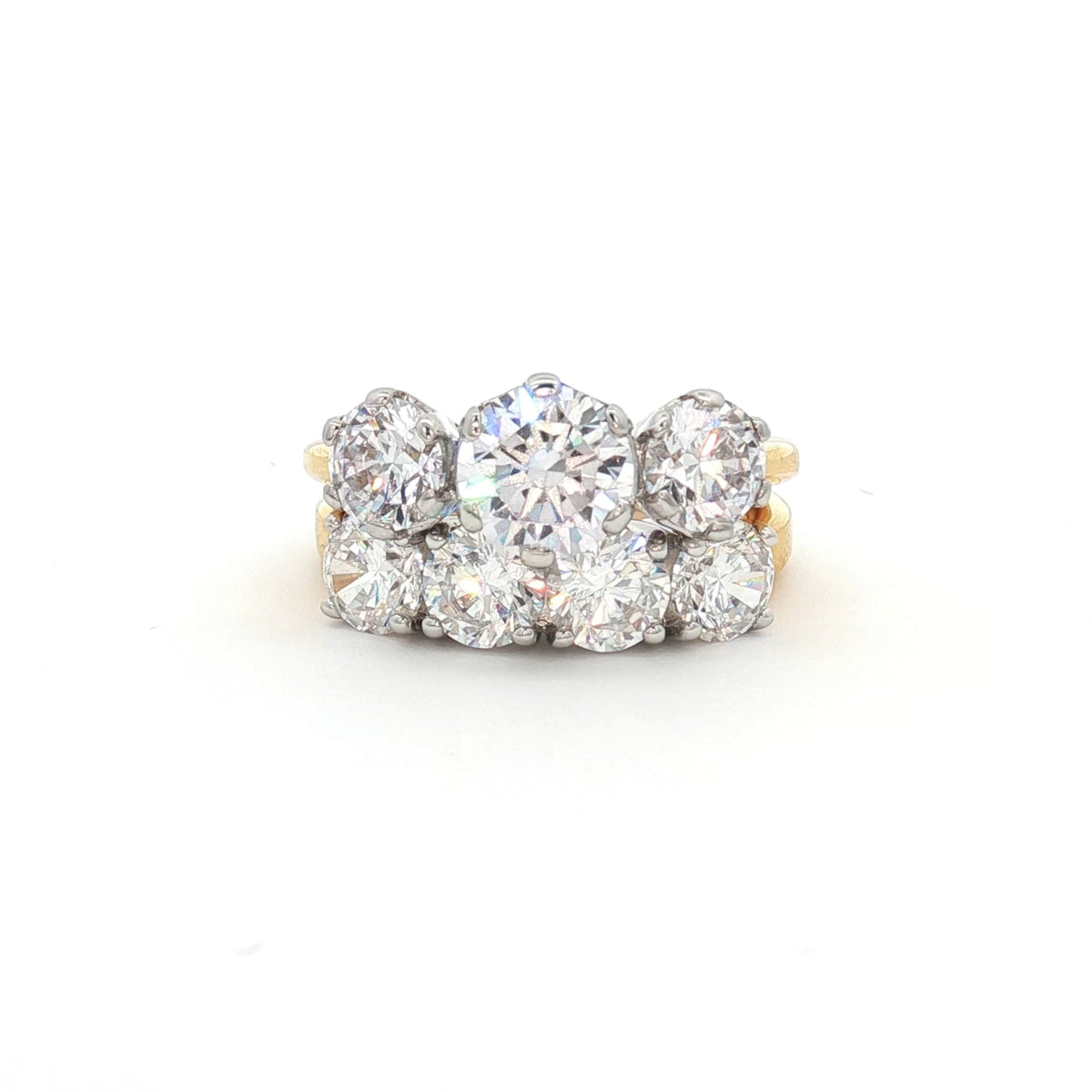 Classic Trilogy Ring and Traditional Four Stone Ring