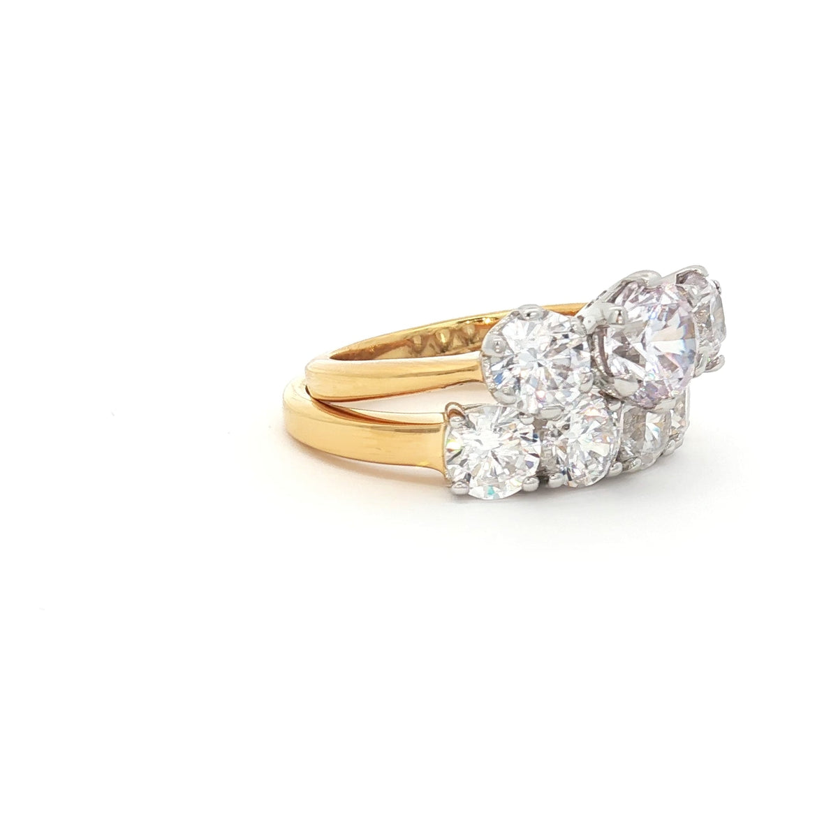 Classic Trilogy Ring and Traditional Four Stone Ring