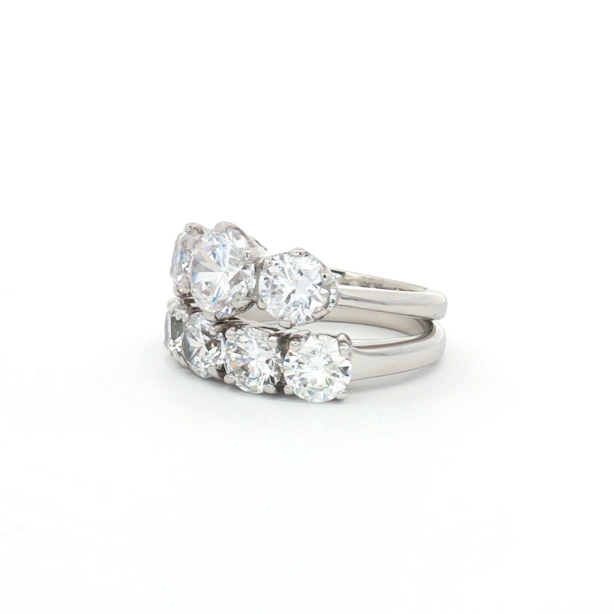 Classic Trilogy Ring and Traditional Four Stone Ring
