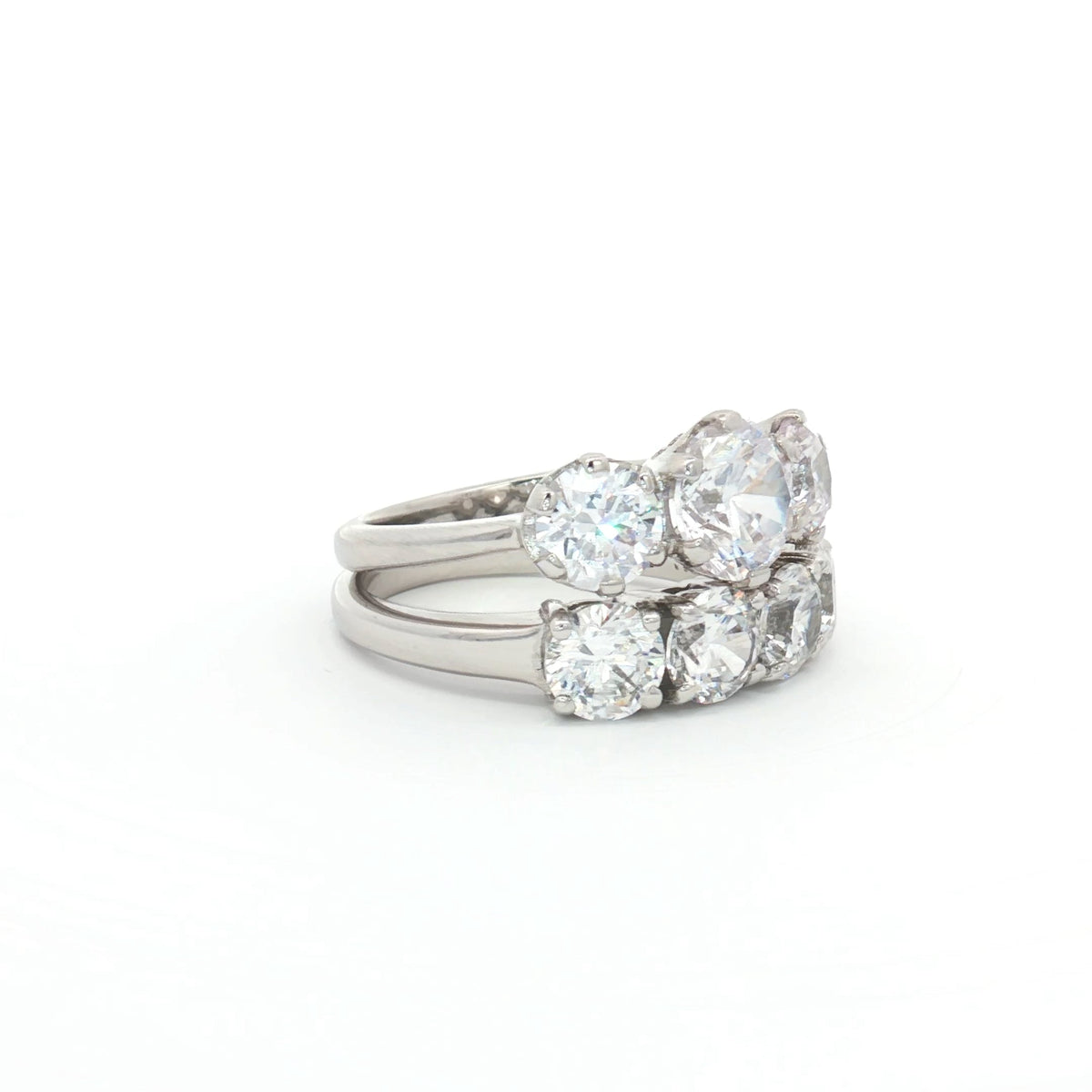 Classic Trilogy Ring and Traditional Four Stone Ring