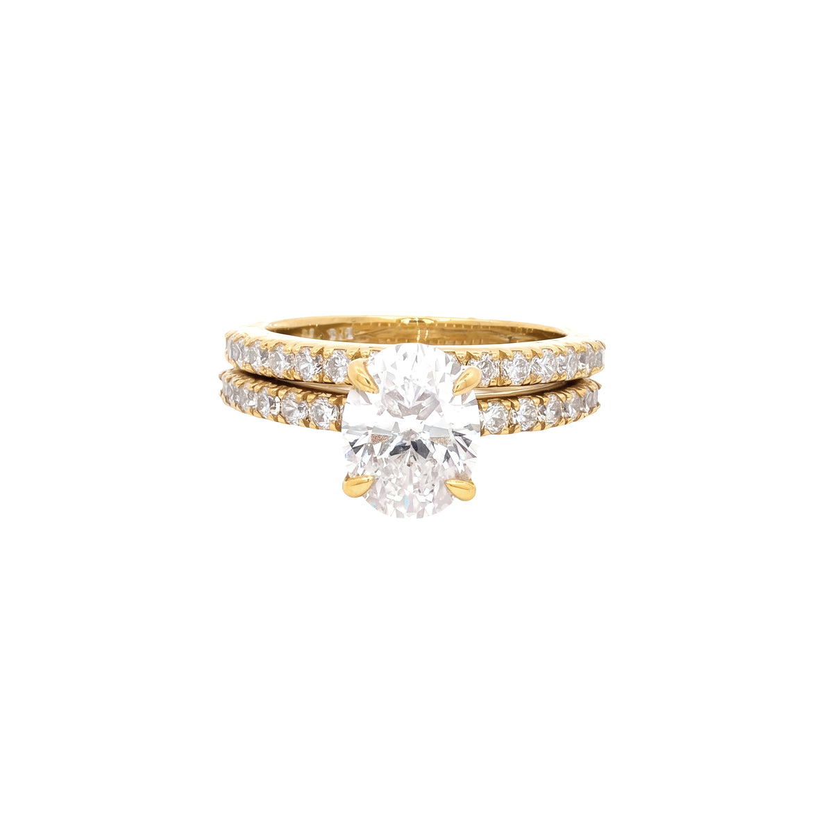 Oval Cut Soliatire Ring with Pave Setting and Matching Band