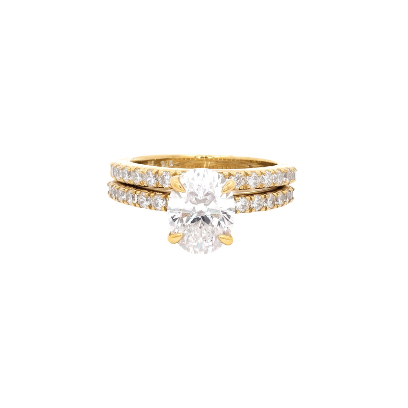 Oval Cut Soliatire Ring with Pave Setting and Matching Band