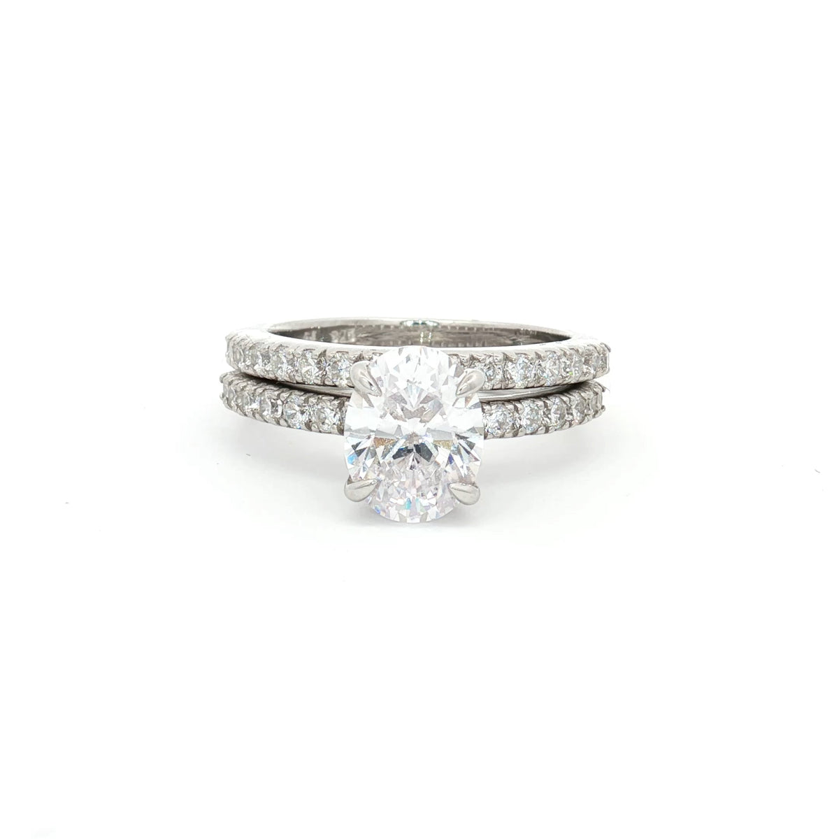 Oval Cut Soliatire Ring with Pave Setting and Matching Band