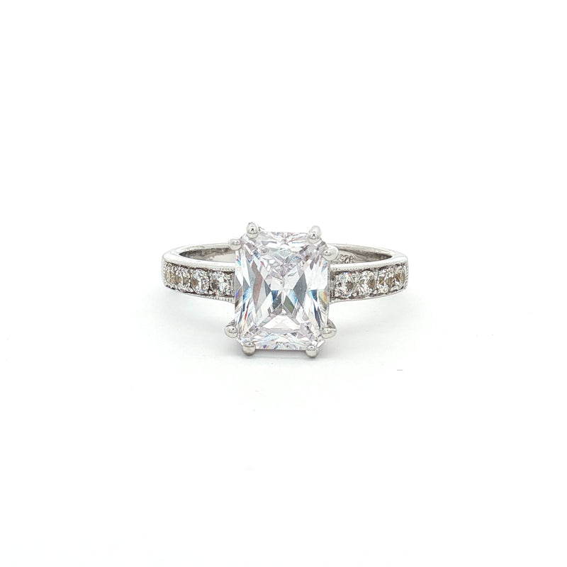 Emerald Cut Solitaire Ring with Side Diamonds