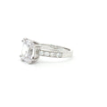 Emerald Cut Solitaire Ring with Side Diamonds