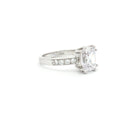 Emerald Cut Solitaire Ring with Side Diamonds