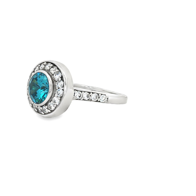 Brilliant Cut Bezel Set Halo Ring with Blue Topaz Centre Stone