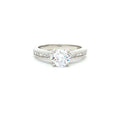Petite Brilliant Cut Solitaire Ring with Princess Cut Channel Setting