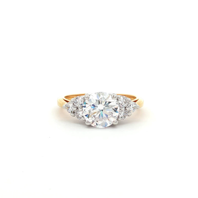 Brilliant Cut Ring with Small Brilliant Stones