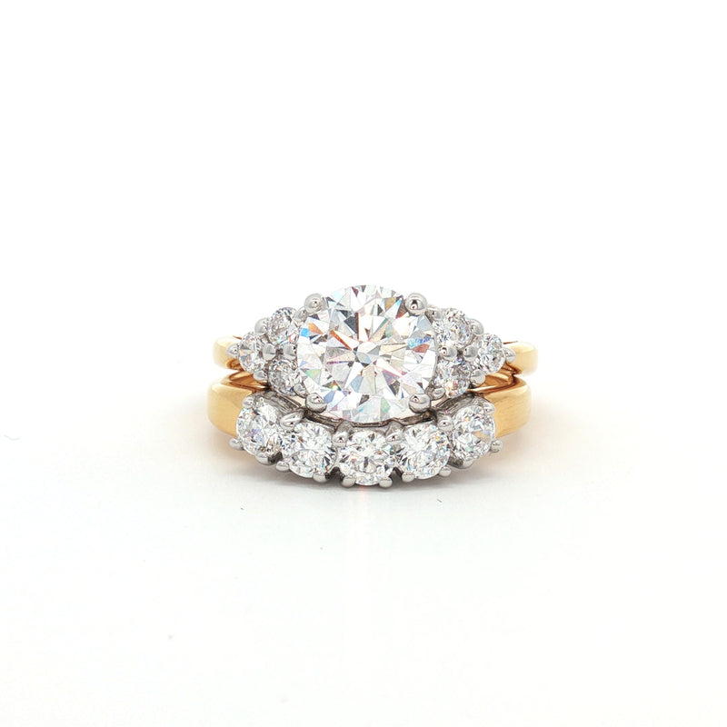 Brilliant Cut Ring with Small Brilliant Stones and Five Stone Curved Band