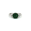 Brilliant Cut Ring with Small Brilliant Stones with Emerald Centre Stone