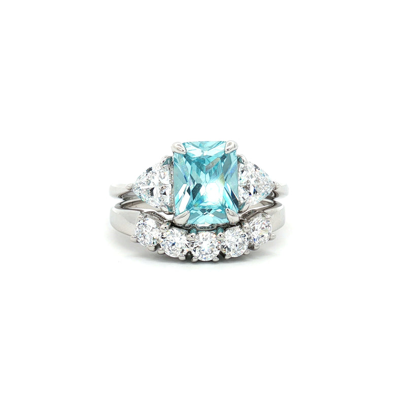 Radiant Cut Aqua Marine  Ring with Two Trillion Side Stones and Five Stone Curved Band