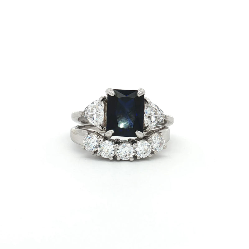 Radiant Cut Sapphire  Ring with Two Trillion Side Stones and Five Stone Curved Band
