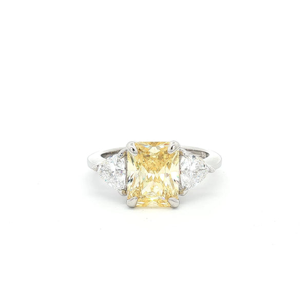Radiant and Trillion Cut Ring with Yellow Stone
