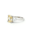 Radiant and Trillion Cut Ring with Yellow Stone