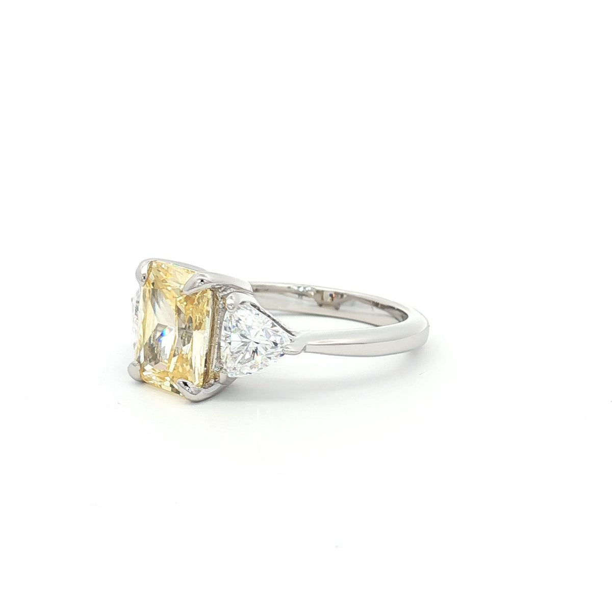 Radiant and Trillion Cut Ring with Yellow Stone