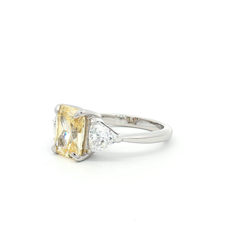 Radiant and Trillion Cut Ring with Yellow Stone