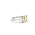 Radiant and Trillion Cut Ring with Yellow Stone