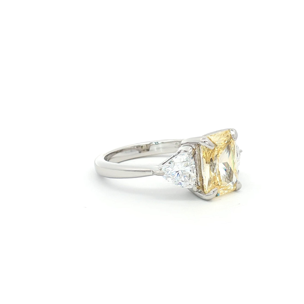 Radiant and Trillion Cut Ring with Yellow Stone