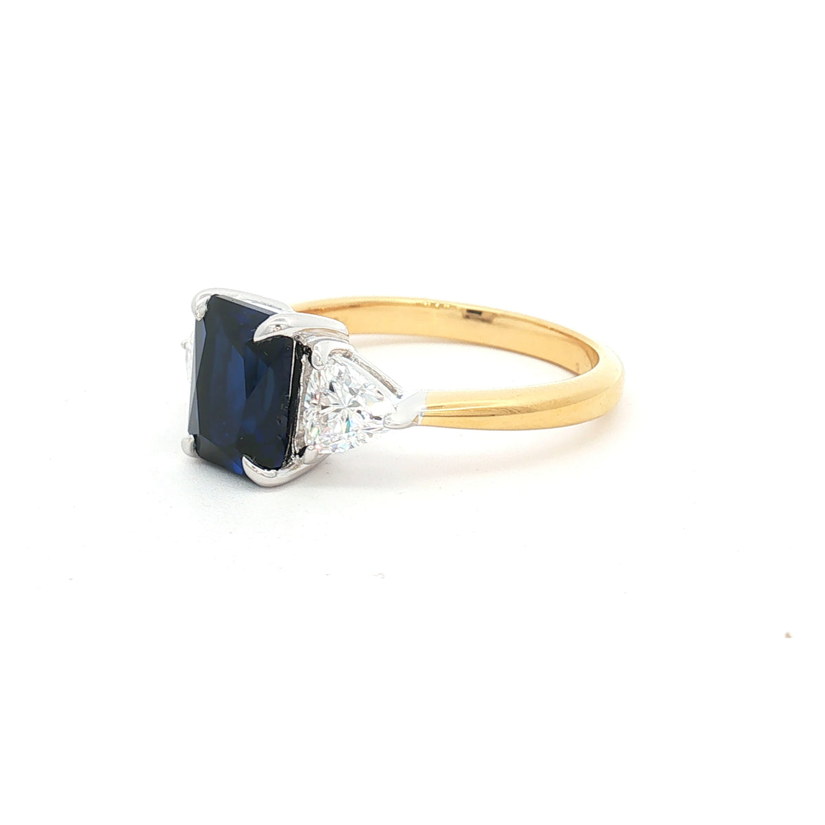 Radiant and Trillion Cut Ring with Sapphire Stone in yellow gold