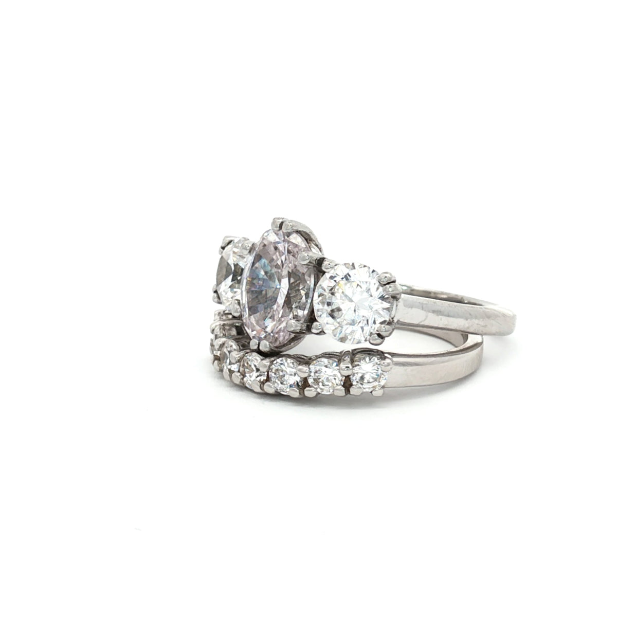 Oval Cut Ring with Two Brilliant Side Stones and Seven Stone Curved Band