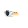 Oval Cut Ring with Two Brilliant Side Stones with Sapphire Centre Stone