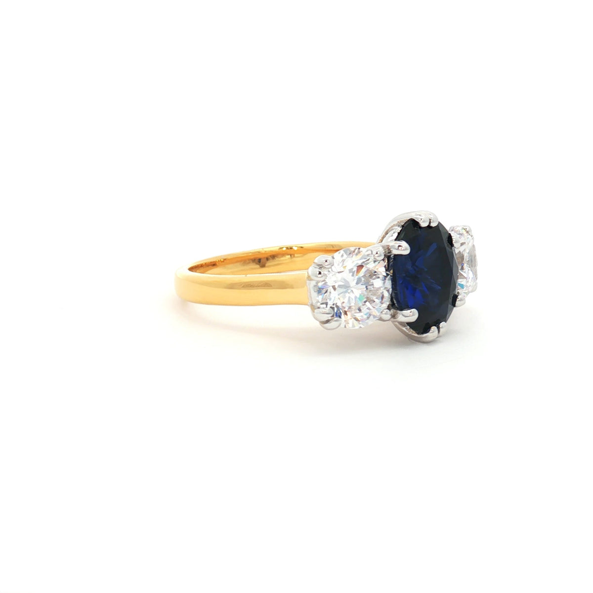 Oval Cut Ring with Two Brilliant Side Stones with Sapphire Centre Stone