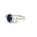 Oval Cut Ring with Two Brilliant Side Stones with Sapphire Centre Stone
