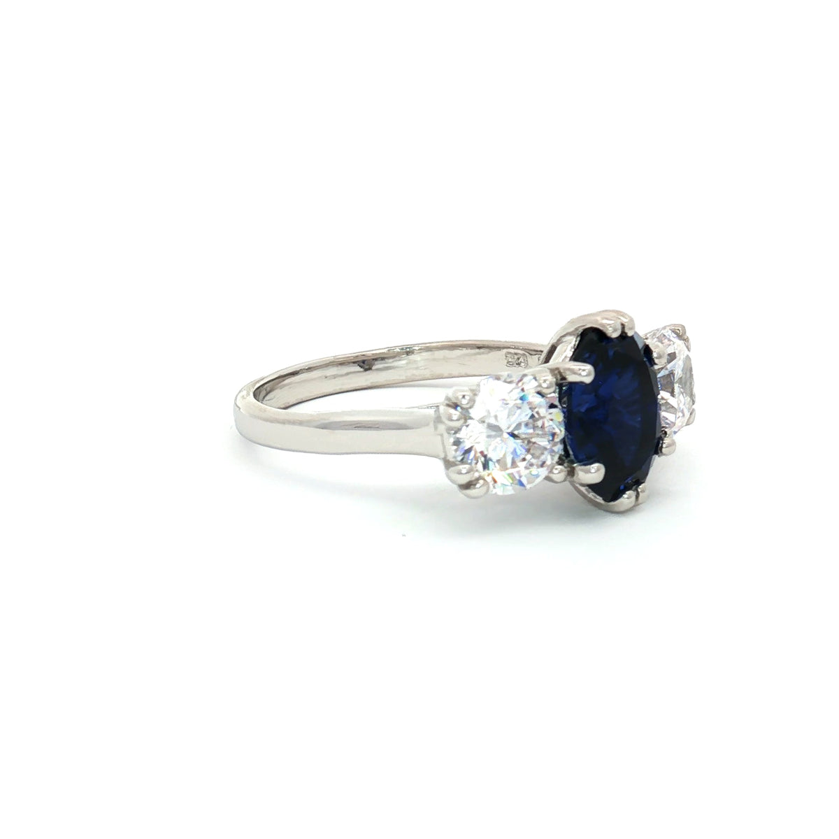 Oval Cut Ring with Two Brilliant Side Stones with Sapphire Centre Stone